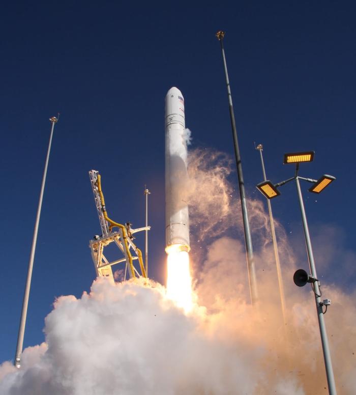Antares rocket taking off from pad 0A as hydraulically operated TEL structure pitches back.