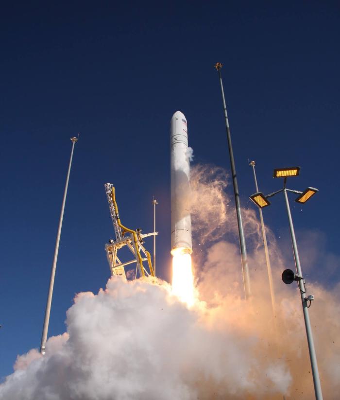 Antares rocket at launch lifting off of pad 0A with its hydraulically controlled TEL