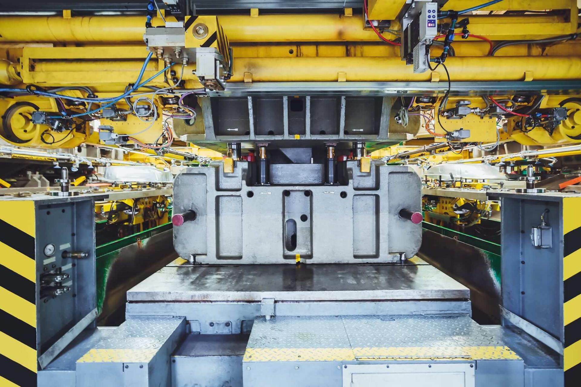 Complex industrial forming machine with mill type hydraulic cylinders.