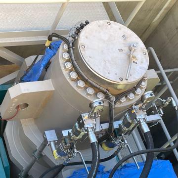 Top view of large bore hydroelectric dam outlet gate hydraulic cylinder with internal manual dogging mechanism